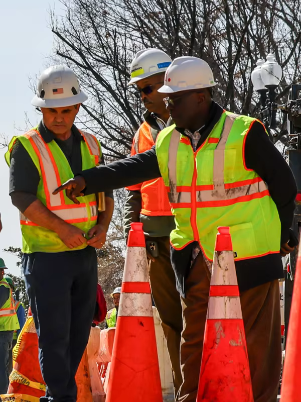 Roadwork crew wearing ANSI Class 2 reflective vests