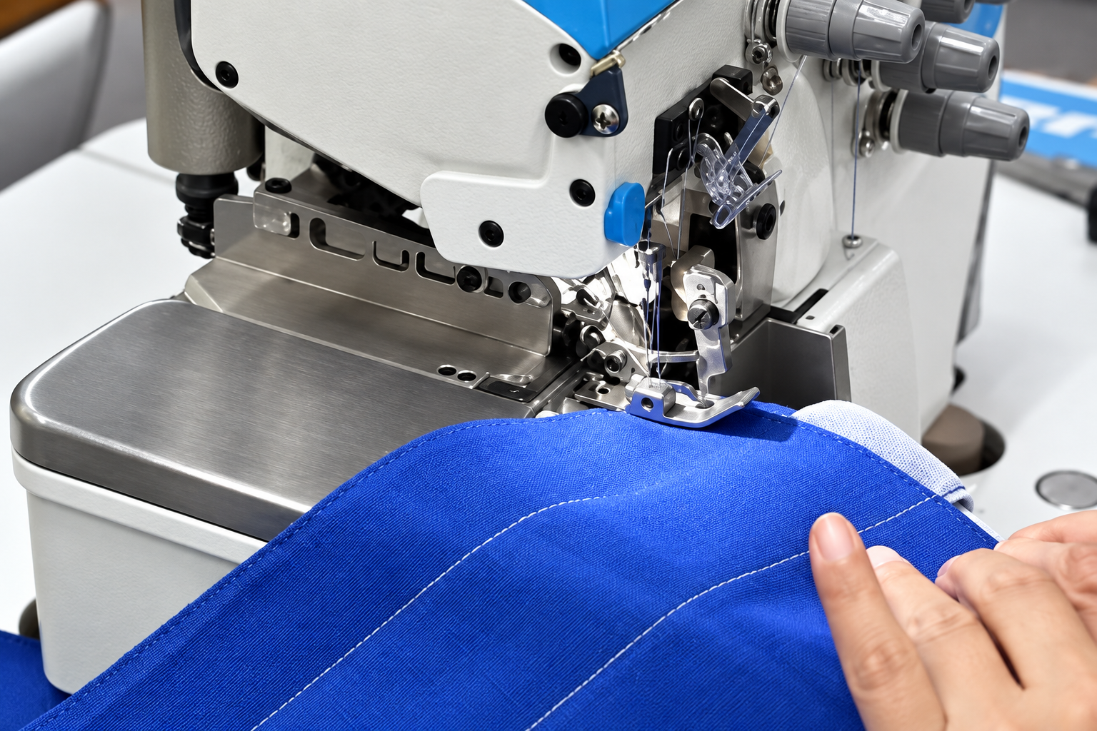 Industrial stitching close-up for safety workwear construction