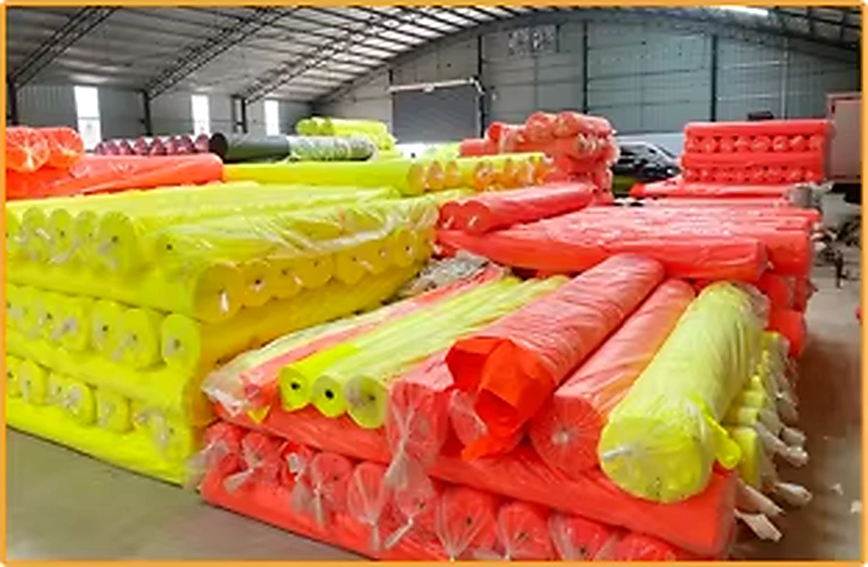 Fluorescent fabric rolls prepared for safety workwear production
