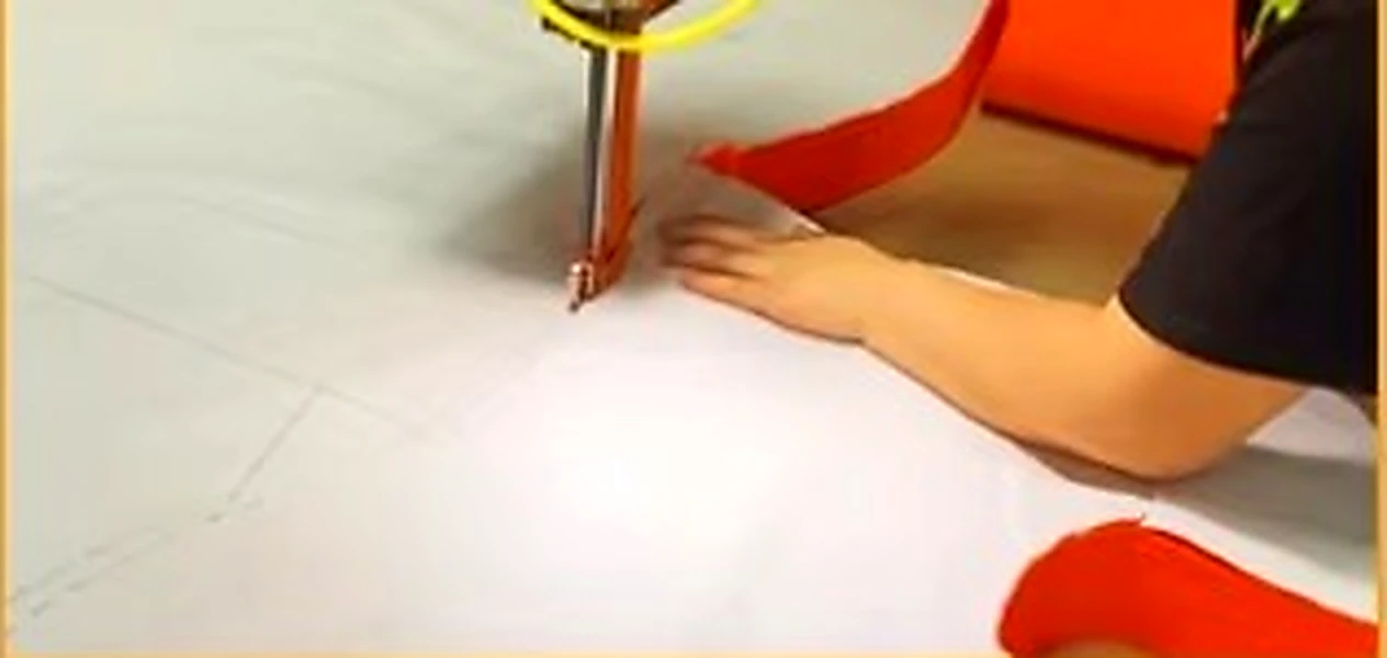Automated fabric cutting and pattern grading in an industrial garment workshop; factory production reference.