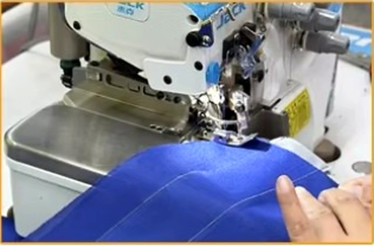 Industrial stitching close-up for safety workwear construction